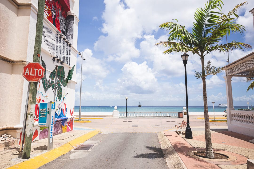 A street corner in downtown Cozumel looking out to the ocean